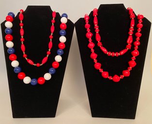 Collection Of 3 Red Beaded Necklaces With One Red White And Blue Jumbo Bead Necklace