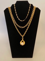 Collection Of Extra Long Gold Tone Chain Necklaces, Including One With Faux Pearl Pendant