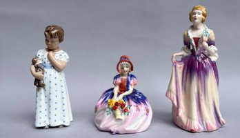 Three Porcelain Figurines Of Women