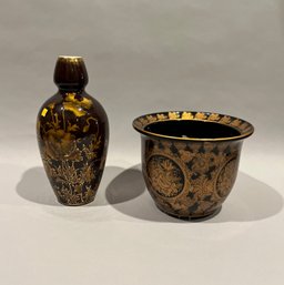 One Black And Gold Vase And One Black And Gold Planter