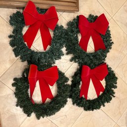 Four Artificial Christmas Holiday Wreaths With Bows