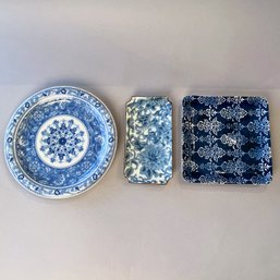 Three Blue And White Plates