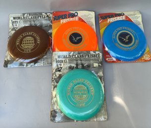 Group Of 4 Whamo SuperPro And World Class Frisbees