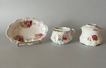 Bavarian Porcelain Vanity Items Including A Dish, Hair Receiver And Moustache Teacup