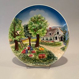 Vintage Three Dimensional Decorative Hand Painted Plate Depicting Apple Picking, West Germany, 20th Century