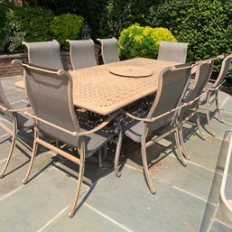 Cast Aluminum Rectangular Outdoor Table With 9 Arm Chairs In Cinnamon Finish By Beka