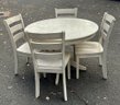 Round Whitewashed Wooden Table With Four Chairs