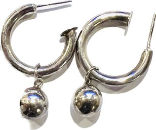 Sterling Silver Hoop Earrings With Drop Ball Charm Design
