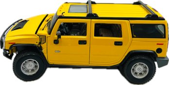 Maisto Premiere Edition Hummer H2 Suv Yellow - 1/18 Scale Bonus Display