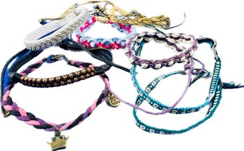 Collection Of Woven & Lariat Bracelets Plus One Leather Charm Bracelet