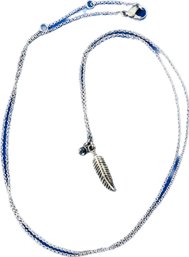 Silvertone Long Necklace With Feather & Faceted Stone Dangling Charms