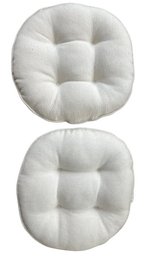 TWO Off-White Round Cushions