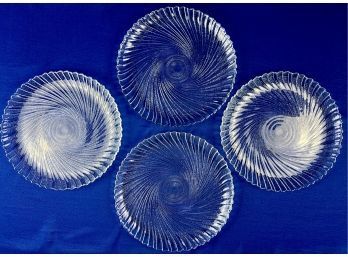 Four Glass Plates With Swirl Design