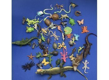 Large Group Of Plastic Insects, Amphibians, And Dinosaurs