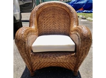 Wicker Or Woven Rattan Chair With White Cushion
