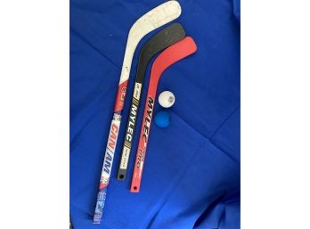 Rug Hockey Sticks And Balls