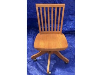 Swiveling Wooden Desk Chair On Casters