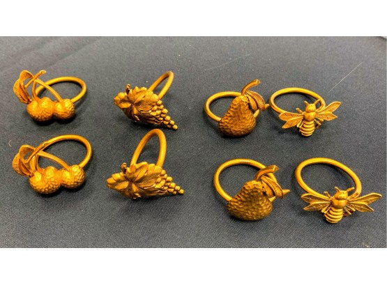 Eight Gold Napkin Rings