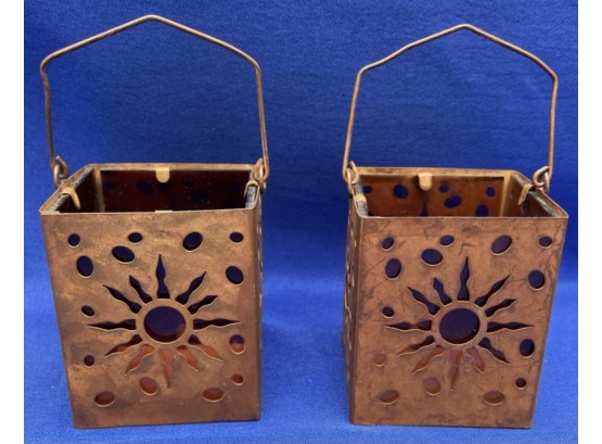 A Pair Of Iron Candle  Or Votive Holders