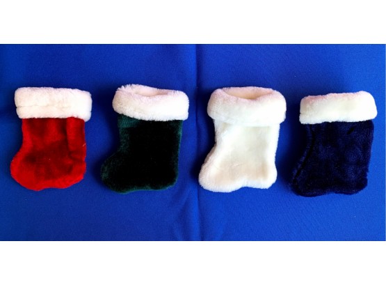 Four Small Christmas Stockings