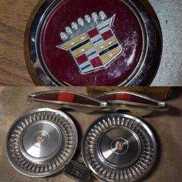 Cadillac Hubcaps (2), Lights (2) And Emblem (shown In Photos)