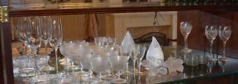 Shelf Of Frosted Glass, Shot Glasses, Bud Vases, Champagne Glasses And Others Pictured On This Shelf