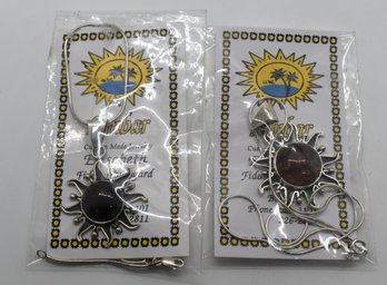 Pair Of Sterling Silver Sun And Amber Necklaces