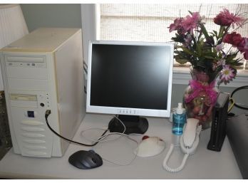 Computer And Items On Desk