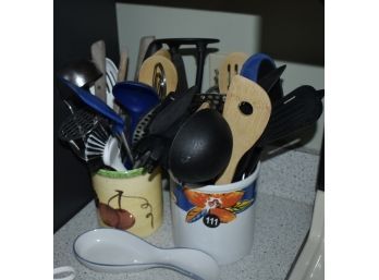 Kitchen Utensils In Containers And Spoon Holder