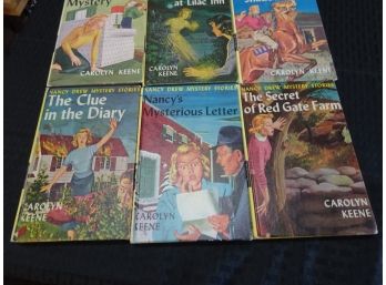 6 Nancy Drew Books.