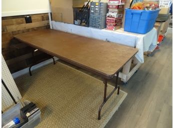 Brown Plastic Table. 30' X 72' X 30' Tall.