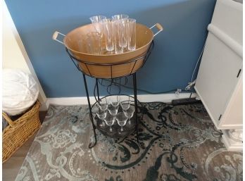 Wine Caddy And Ice Tub With Plastic Stemware On Top And Glass Stemware On Bottom.