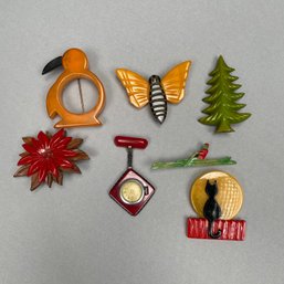 Six Bakelite Pins And A Butterfly Buckle