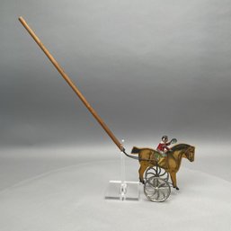 Child's Tin & Lithograph Jockey & Horse Push Toy