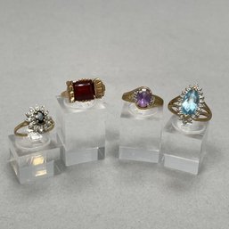 Four 10k Yellow Gold Rings