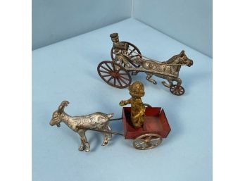 Two Cast Iron Toys: A Horse Drawn Sulky Toy And A Goat Driven Cart With Boy