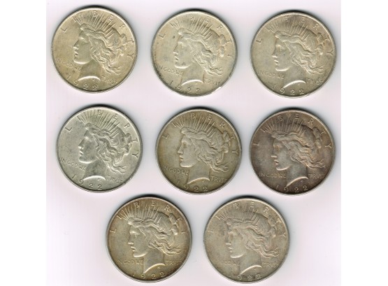 Eight 1922 Peace Silver Dollars