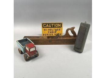 An Early Wooden Block Plane, A Knife Sharpening Wet Stone, And 'MARK' The Painted Wooden Truck, 1975