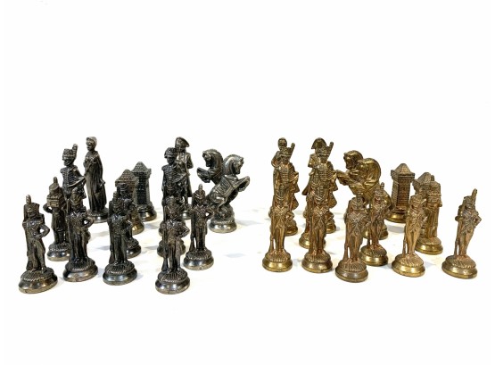 A Set Of Midevil Metal Chess Pieces