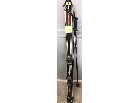 PAIR OF ATOMIC SKIS WITH ROSSIGNOL POLES-B40