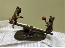 (X33) ANTIQUE AUSTRIAN BRONZE - TWO DOGS ON A SEESAW WITH FLOWERS - MOVABLE SEESAW -AMAZING! 4'