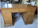 SOLID WOOD VINTAGE DESK - MONITOR FURNITURE CO. -8 DRAWERS - SOME INK ON TOP -46' BY 24' DEEP BY 30' HIGH