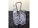 (C-36) LOT OF TWO - ANTIQUE GLASS CASTOR SETS  WITH STANDS - 4 MATCHING BOTTLES EACH - 10' TALL