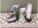 (G-17) TWO ANTIQUE GERMAN PORCELAIN FAIRING  PIG  FIGURINES - KICKING PIG & PIG IN TROUGH - C.1920S  - 3'