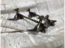 (X30) PAIR OF ANTIQUE VICTORIAN SILVER PLATE KNIFE RESTS -WHIPPET DOGS -4'