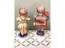 (A-39) LOT OF 2  VINTAGE HUMMEL FIGURINES - BOY W/BACKPACK & GIRL W/FLOWERS - ALL UNDAMAGED - 4-5' TALL