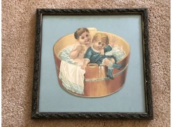 (E-17) ANTIQUE FRAMED LITHO - TWO BOYS IN WASH BUCKET  -9' BY 9'