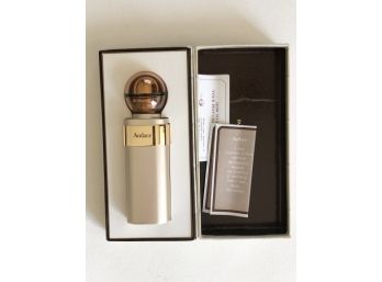 (E16) AUDACE PARFUM ATOMIZER-REFILLABLE-APPROX. 1/2 FILLED WITH PERFUME