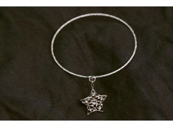 (A1) COSTUME BRACELET WITH HANGING STAR-ZIRCON CHIPS APPROX 2 1/2' WIDE-APPROX. 3.5 DWT