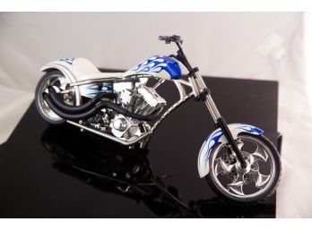 (D2) 2003 WEST COAST CHOPPERS TOY MOTORCYCLE -Black, White And BlUE MEASURES APPROX 12' X 6 ''S T